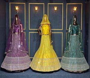 Tenue de mariage en lehenga choli en tissu filet avec broderie au fil, travail de miroir et décoration de pierres, disponible en 20 couleurs et 10 modèles - Product Image 3