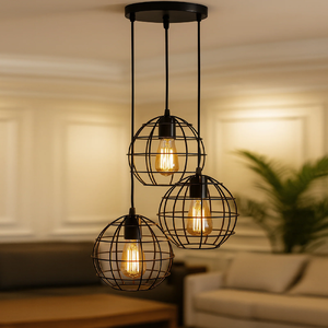 Industrial <b>black</b> metal globe trio pendant lamp with exposed filament <b>light</b> <b>bulbs</b>, available at wholesale prices. - Product Image 1