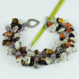 Pulsera de lujo hecha a mano con gemas de colores y formas variadas, accesorio moderno para mujer, ideal para fiestas, aniversarios y bodas. - Product Image 1