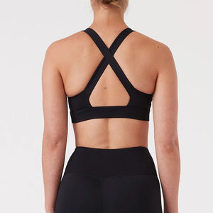 เสื้อชั้นในกีฬาสำหรับผู้หญิง OEM/ODM สกรีนโลโก้ได้ สีขาวดำ ระบายอากาศดี สายไขว้หลัง ยืดหยุ่นสูง เหมาะสำหรับโยคะ พร้อมฟองน้ำเสริมแบบถอดได้ - Product Image 6