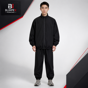 Survêtement vintage pour homme en nylon solide avec fermeture éclair, taille élastique et poches latérales pleine longueur - Product Image 1