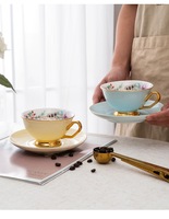 Ensemble de tasses à café et soucoupes en céramique émaillée de couleur classique en gros, avec bordure et poignée dorées