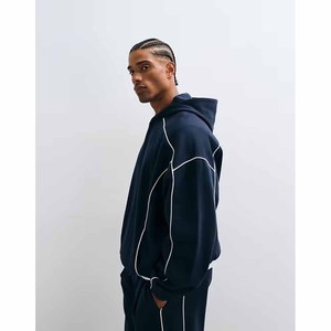 Ensemble de survêtement bleu marine à capuche pour homme, couleur unie, manches longues, coupe ample avec détails de couture blanche, tenue décontractée pour l'automne - Product Image 1