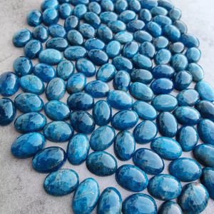 พลอยอะพาไทต์นีออนธรรมชาติทรงรีสีน้ำเงินแบบคาโบชอง ขนาดปรับเทียบแล้ว สำหรับทำเครื่องประดับ คริสตัลบำบัด - Product Image 1