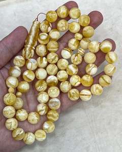 ลูกประคำทรงกลมทำมือจากเรซิ่นสีเบจคลาสสิก หรูหรา เป็นมิตรกับสิ่งแวดล้อม สำหรับงานปาร์ตี้ - Product Image 2