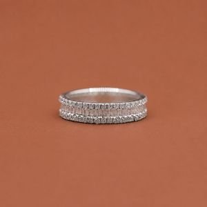Anillo de Eternidad de Plata S925 Premium con Moissanita y Diamantes Baguette, Acabado Nupcial - Product Image 1