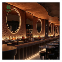 Comptoir de bar commercial de luxe, forme organique, mobilier de bar lounge avec étagère à vin rétroéclairée pour pub