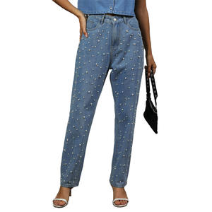 Jeans ajustados negros para mujer con adornos laterales elegantes y dobladillo sin rematar, de cintura alta, elásticos, de mezclilla perlada. - Product Image 1