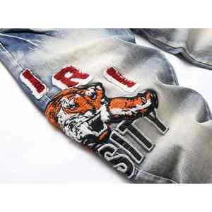 สร้างความโดดเด่นด้วยงานปักลายนกและธรรมชาติที่ได้รับแรงบันดาลใจจากแบรนด์ของเรา บนกางเกงยีนส์ปักลายสุดพิเศษนี้ - Product Image 6