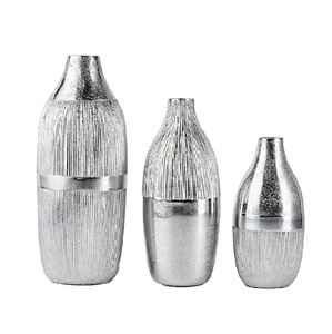 Jarrón de flores con forma nueva para mesa y decoración, maceta de metal para decoración del hogar y la sala de estar - Product Image 1