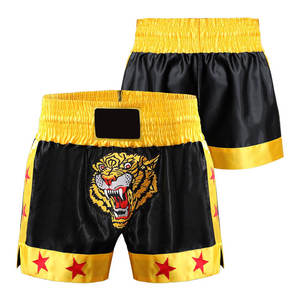 กางเกงมวยไทยชาย สีดำลายเสือเหลือง ปักลายเสือ สำหรับฝึกซ้อมและแข่งขัน ทรงปกติ ผ้าโพลีเอสเตอร์ยืดได้ สำหรับผู้ใหญ่ - Product Image 1
