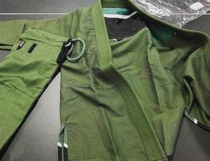 BJJ GI เครื่องแต่งกายเสริมความแข็งแรงผ้าฝ้าย100% 450กรัมแห้งเร็วระบายอากาศทนทานใช้ได้ทั้งชายและหญิงผลิตจากโรงงานถักทอ - Product Image 1