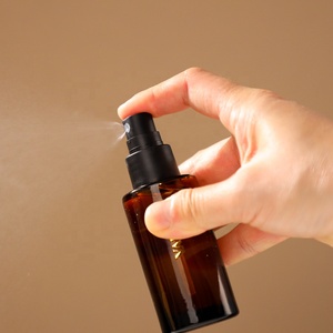 Bottiglia in Vetro Ambrato Cilindrica Portatile da 40ml 60ml 100ml con Pompa Spray Nera Opaca e Coperchio per Profumi e Fragranze per la Casa - Product Image 3