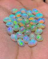Opale naturelle cabochon, pierre précieuse ovale polie, pour la création de bijoux, prix de gros disponible.