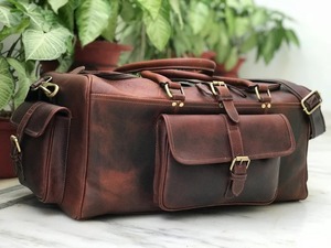 กระเป๋าเดินทางหนังแท้ จำหน่ายส่ง กระเป๋าแบบดัฟเฟิล ขนาด 36-55 ลิตร น้ำหนักเบา ความจุเยอะ พกพาสะดวก ใส่รองเท้าได้ - Product Image 5