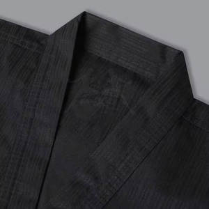 Kimono de Karate Ligero con Costuras Reforzadas y Tela de Algodón Suave para Práctica Diaria - Product Image 5