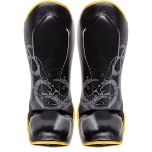 Adult Black PU Leather Shin Guards With Gold Trim Sublimation Design Hook And Loop Closure Lightweight Sports Protection - Product Image 1