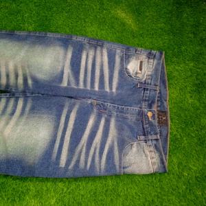 กางเกงยีนส์ทรงแบ็กกี้พิมพ์ลายกราฟฟิตีใหม่สำหรับผู้ชาย สไตล์วินเทจ Y2K สีน้ำเงินขาดๆ แบบฮาราจูกุ กางเกงเดนิมทรงตรงขาตรงสไตล์ไฮสตรีท - Product Image 5