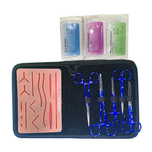 Kit de sutura para estudiantes de medicina y veterinaria que incluye materiales de simulación de piel e instrumentos quirúrgicos para suturar - Product Image 1