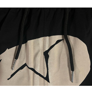 Shorts pour homme à imprimé crâne noir avec cordon de serrage à la taille, style streetwear décontracté - Product Image 5