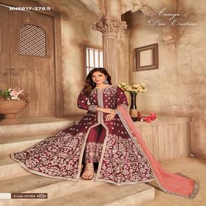 Fournisseur indien de salwar kameez en soie artificielle et santoon, aux couleurs éclatantes et au travail de miroir véritable, pour des tenues de festival magnifiques. - Product Image 1