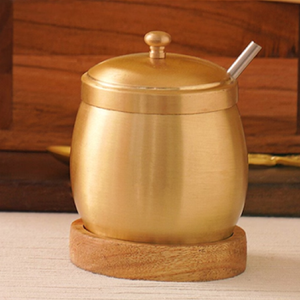 Antique dark finish brass ghee <b>pot</b> with a beautiful floral motif and a golden spoon. Available at wholesale price. - Product Image 4