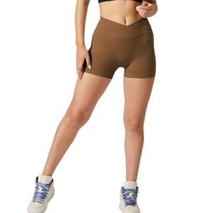 Vente en gros Short de yoga motard sans coutures Short de yoga de couleur unie pour femmes en cours d'exécution Short de yoga contrôle du ventre pour femmes Short de yoga jaune - Product Image 1
