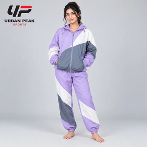 Custom <b>Women</b> <b>Windbreaker</b> Tracksuit With Contrast Color Panels Personalized Artwork And Comfortable Athletic Construction - Product Image 1