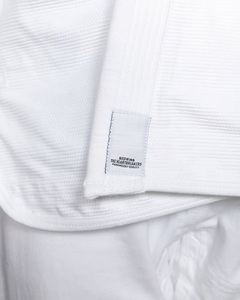 Kimono de Jiu-Jitsu blanc personnalisé, uniforme de BJJ de qualité supérieure, tissage perlé 450 GSM, 100 % coton, kimono de Jiu-Jitsu brésilien - Product Image 4