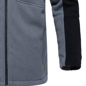 Veste en polaire chaude avec tissu doux et poches zippées sécurisées pour les activités de plein air par temps froid - Product Image 4