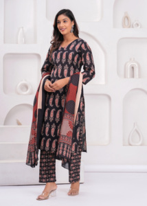 The straight-cut black kurti showcases timeless ethnic motifs, paired beautifully with matching printed <b>ankle</b>-length trousers. - Product Image 2