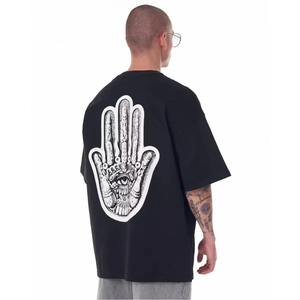 T-shirt ample en coton doux, coupe moderne et design épuré pour un look urbain décontracté. - Product Image 2