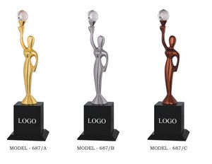 Elegant Dial Shaped Lady Metal Statue In Luxurious Golden Silver and Copper Finishes For Office Desk And Shelf Styling - Product Image 1