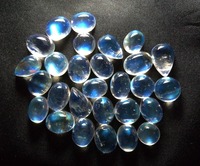 Pierres précieuses naturelles de pierre de lune ovale pour la fabrication de bijoux, effet feu bleu arc-en-ciel, en vrac, vente en gros auprès du fournisseur indien GEMFORTE INC