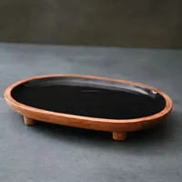 Grande assiette ovale en bois sculptée à la main, noire, pour le service du pain, avec finition émail colorée, design personnalisé, luxe et élégance de haute qualité