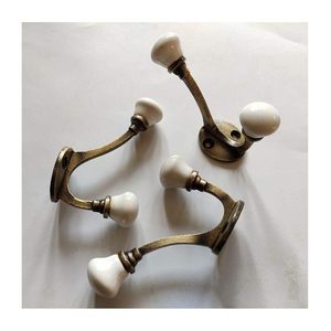 Ganchos de pared vintage para abrigos con perillas de cerámica blanca, diseño de metal resistente al óxido para puertas o paredes - Product Image 1