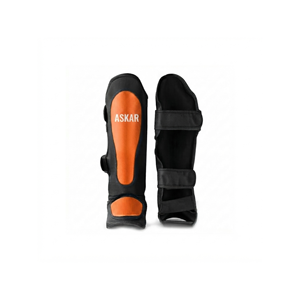 Espinilleras Askar Negras y Naranjas, Equipo de Protección para Boxeo, Artes Marciales y Entrenamiento, Protector de Piernas Unisex - Product Image 1