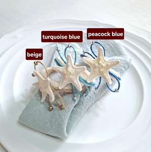Anneau de serviette en bois blanc style étoile de mer, idéal pour les restaurants pour créer une table élégante et bien rangée, provenant d'Inde. - Product Image 4