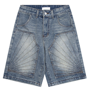 Shorts en jean premium pour homme, bleu indigo délavé, avec broderie géométrique et motifs rayonnants, coupe oversize, style streetwear - Product Image 1