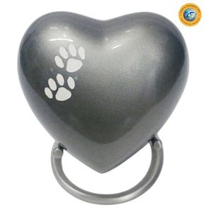 Urna Funeraria para Mascotas en Forma de Corazón Plateada de Linea Exports Inc. con Diseño de Huella de Pata, Recuerdo - Product Image 1