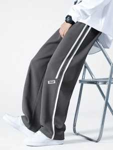 Pantalones Deportivos Anchos Gris Oscuro para Hombre con Franja Lateral Blanca, Estilo Urbano, Casual, Corte Recto - Product Image 2