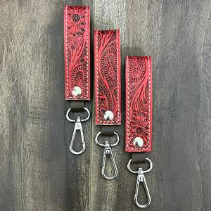 Nouveau 2025 Vente en gros Porte-clés en cuir de vachette personnalisé à motif floral, élégant, sculpté à la main et ciselé, avec dragonne en cuir et pince à clés mignonne - Product Image 4