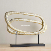 Sculpture abstraite de table en or entrelacé, artisanale et luxueuse, figurine d'art en métal, pièce d'accentuation décorative pour la maison