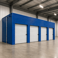 Unités de stockage préfabriquées blanches, entrepôts en acier avec portes à enroulement, grandes unités de stockage