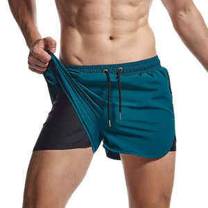 Shorts de sport 2-en-1 personnalisés en polyester pour hommes – Vente en gros, couleur unie, double couche, séchage rapide, pour la course et le basketball - Product Image 4
