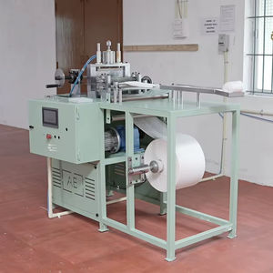 Máquina para enrollar almohadillas de compresión - Product Image 1