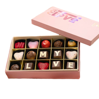 Produit phare : Délicieuses confiseries multicolores au chocolat noir avec biscuits et noix, présentées en coffret cadeau pour souvenir