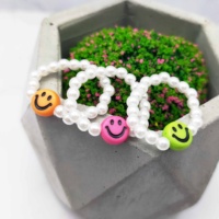 Bague fantaisie en plastique pour femmes, avec cordon élastique et perles, pour filles