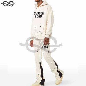 Conjunto Deportivo de Dos Piezas para Hombre, Estilo Patchwork Colorido, Sudadera con Capucha y Pantalones Jogger Acampanados, Diseño Moderno - Product Image 5