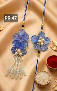 Flower Shape Plastic Rakhi <b>Set</b> with Pearl Tassels Handmade for Wedding Occasion - Product Image 3